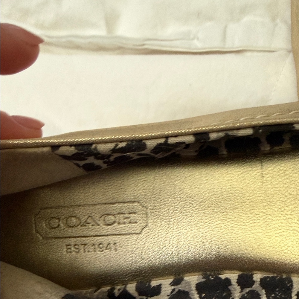 Coach Gold Slip-On Shoes with Animal Print Lining